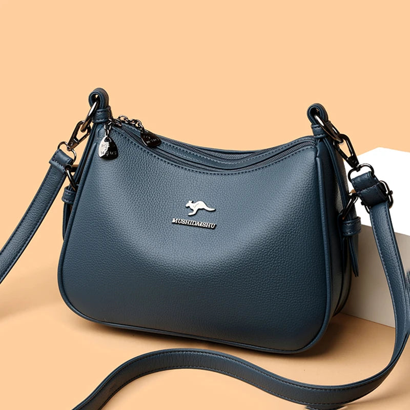 Bolsos de lujo de diseñador para mujer, nuevos bolsos de hombro de cuero de alta calidad para mujer, bolsos cruzados retro y minimalistas