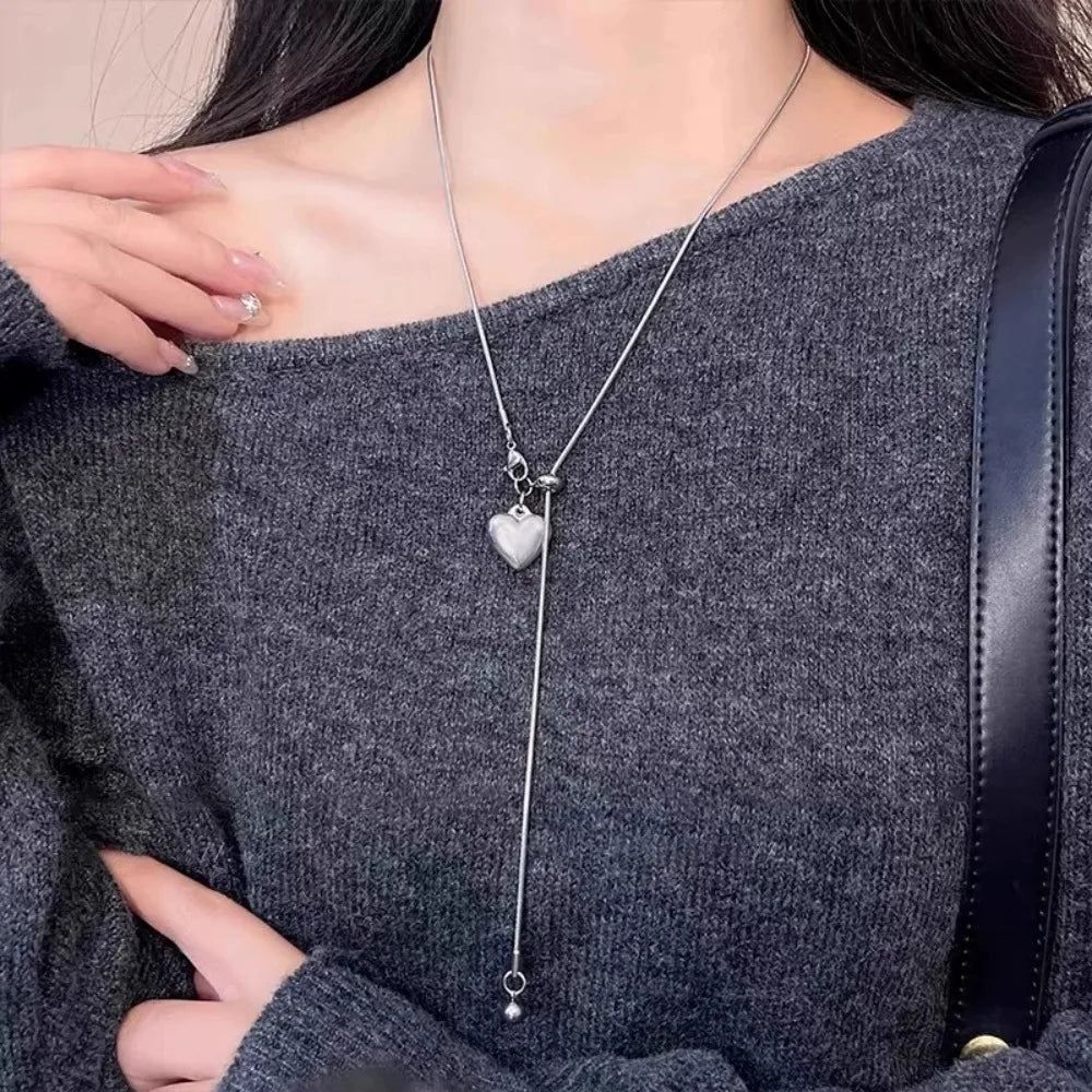 Collar largo de acero inoxidable con colgante de corazón, cadena ajustable para suéter, accesorios de joyería de moda para mujer 2025