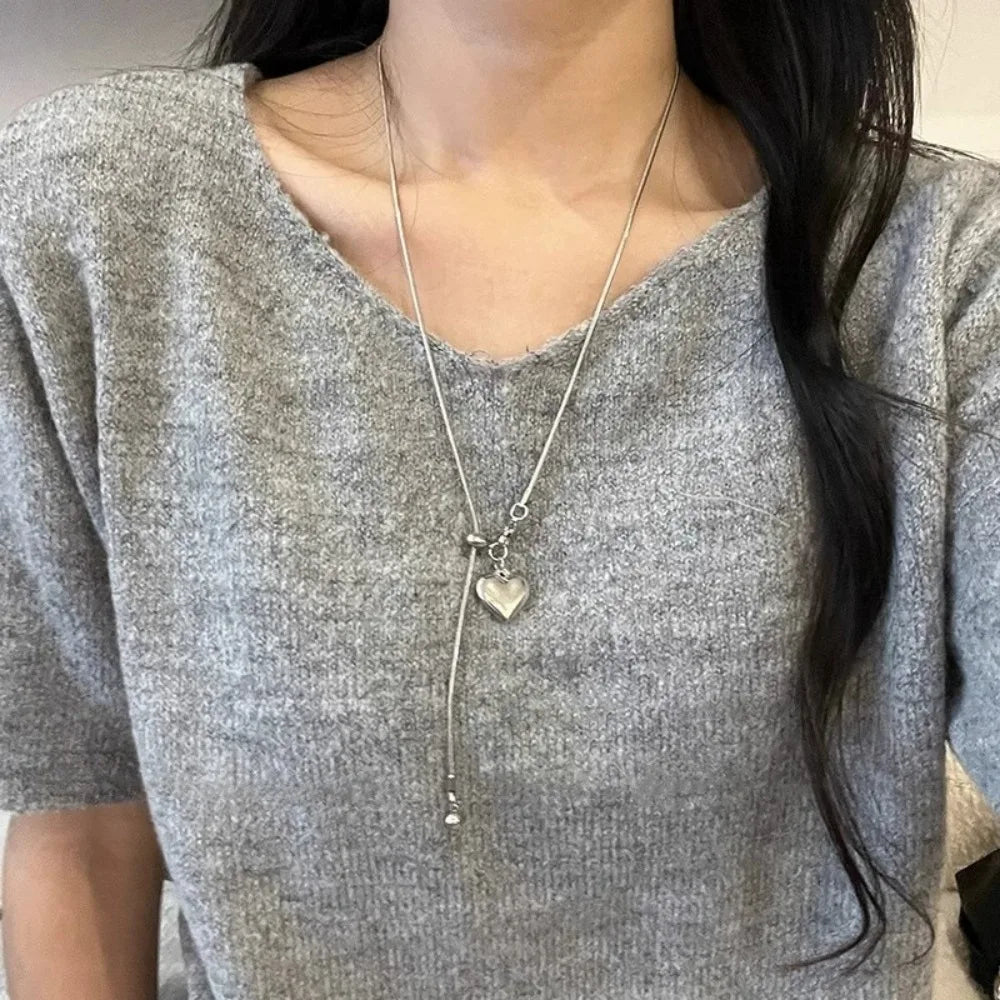 Collar largo de acero inoxidable con colgante de corazón, cadena ajustable para suéter, accesorios de joyería de moda para mujer 2025
